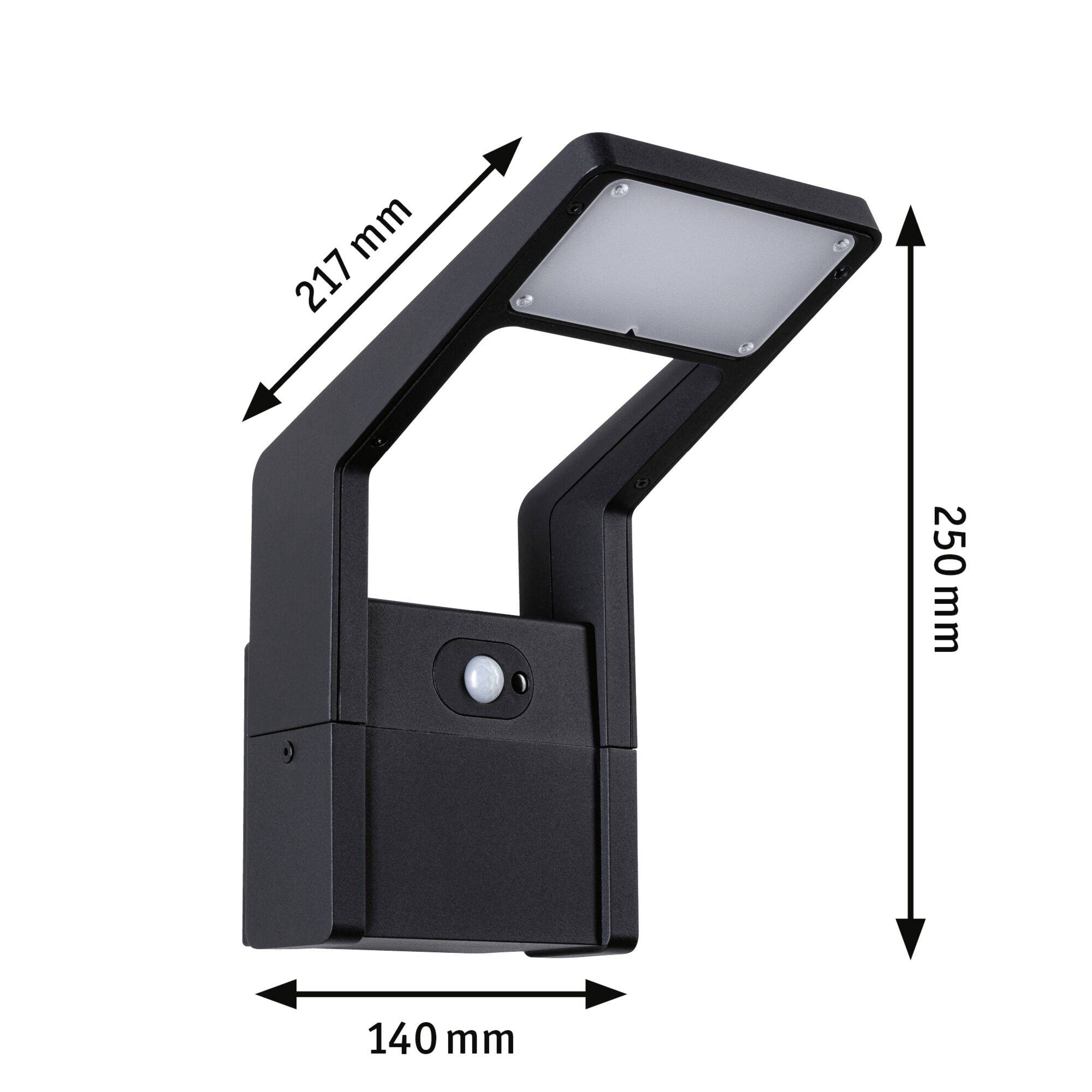 Czarna lampa ścienna z prostokątną głowicą, z czujnikiem ruchu. Wymiary: szerokość 140 mm, wysokość 250 mm, głębokość 217 mm.
