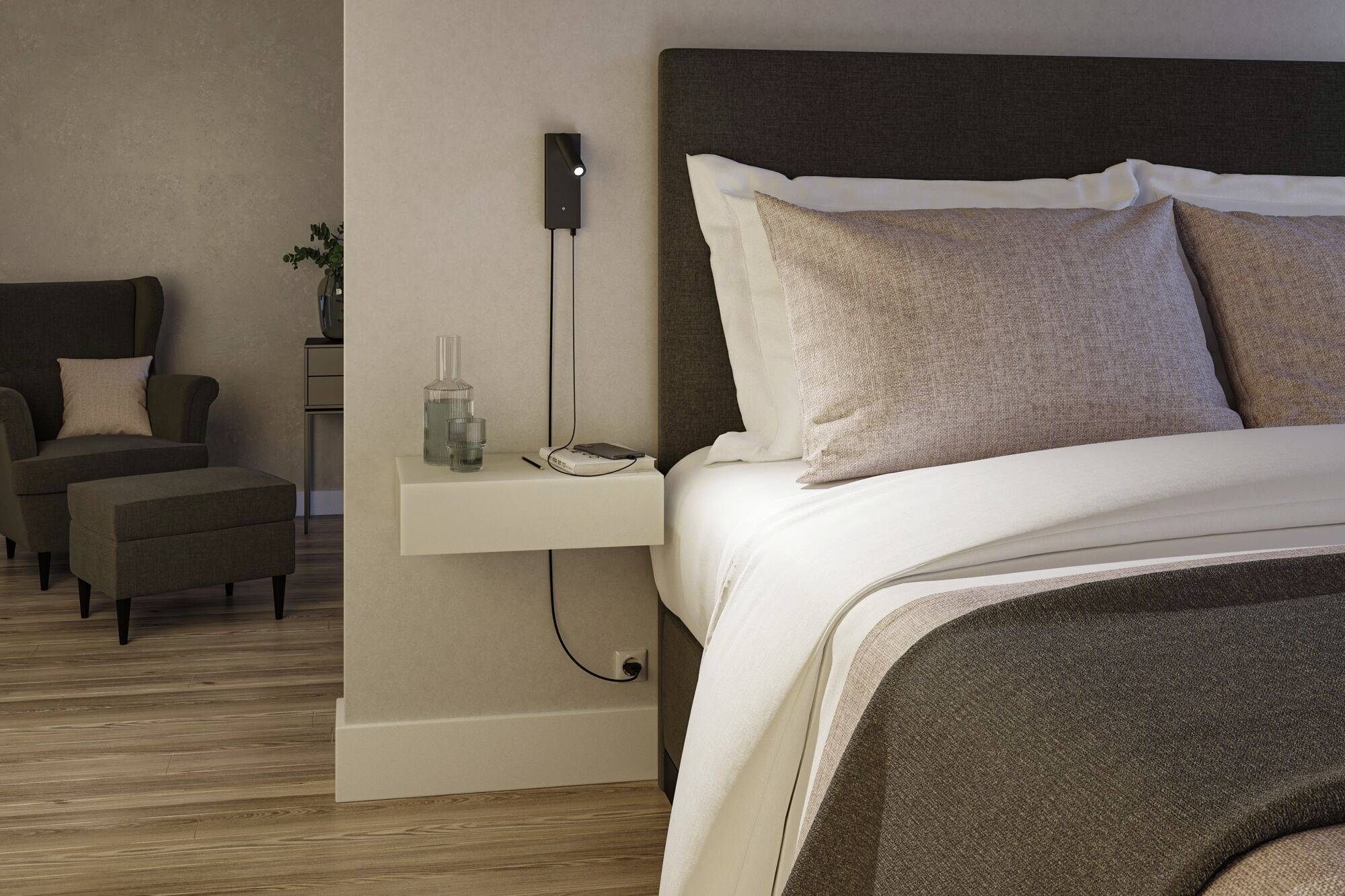 Nowoczesna sypialnia z dużym podwójnym łóżkiem, wygodnymi poduszkami, stolikiem nocnym i przytulnym kącikiem wypoczynkowym w tle.