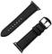 Dwa czarne skórzane paski do zegarka, jeden leży płasko, drugi jest zwinięty i pokazuje klamerkę.