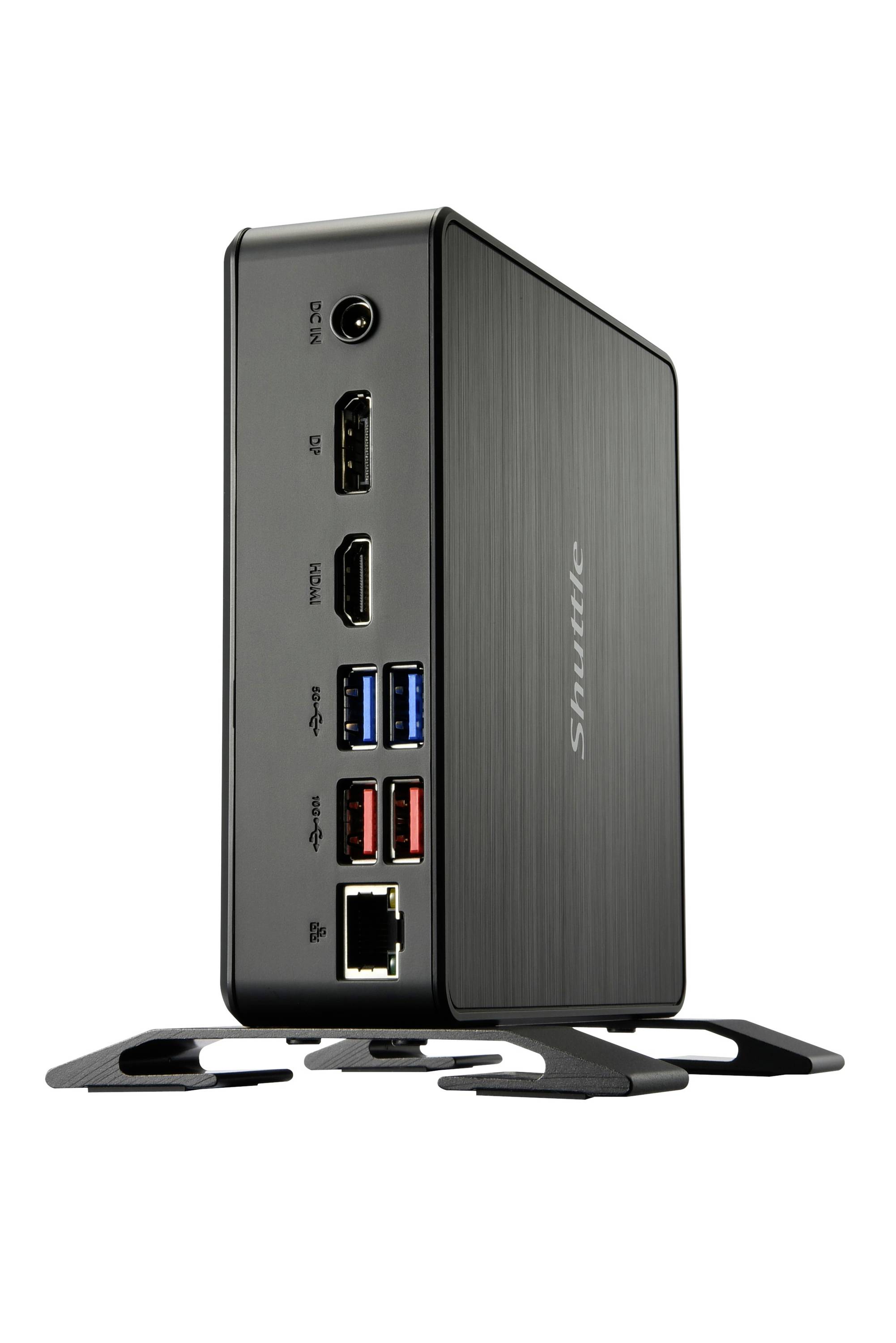 Kompaktowy czarny mini-komputer stojący pionowo na podstawce, wyposażony w złącza takie jak HDMI, USB i Ethernet.