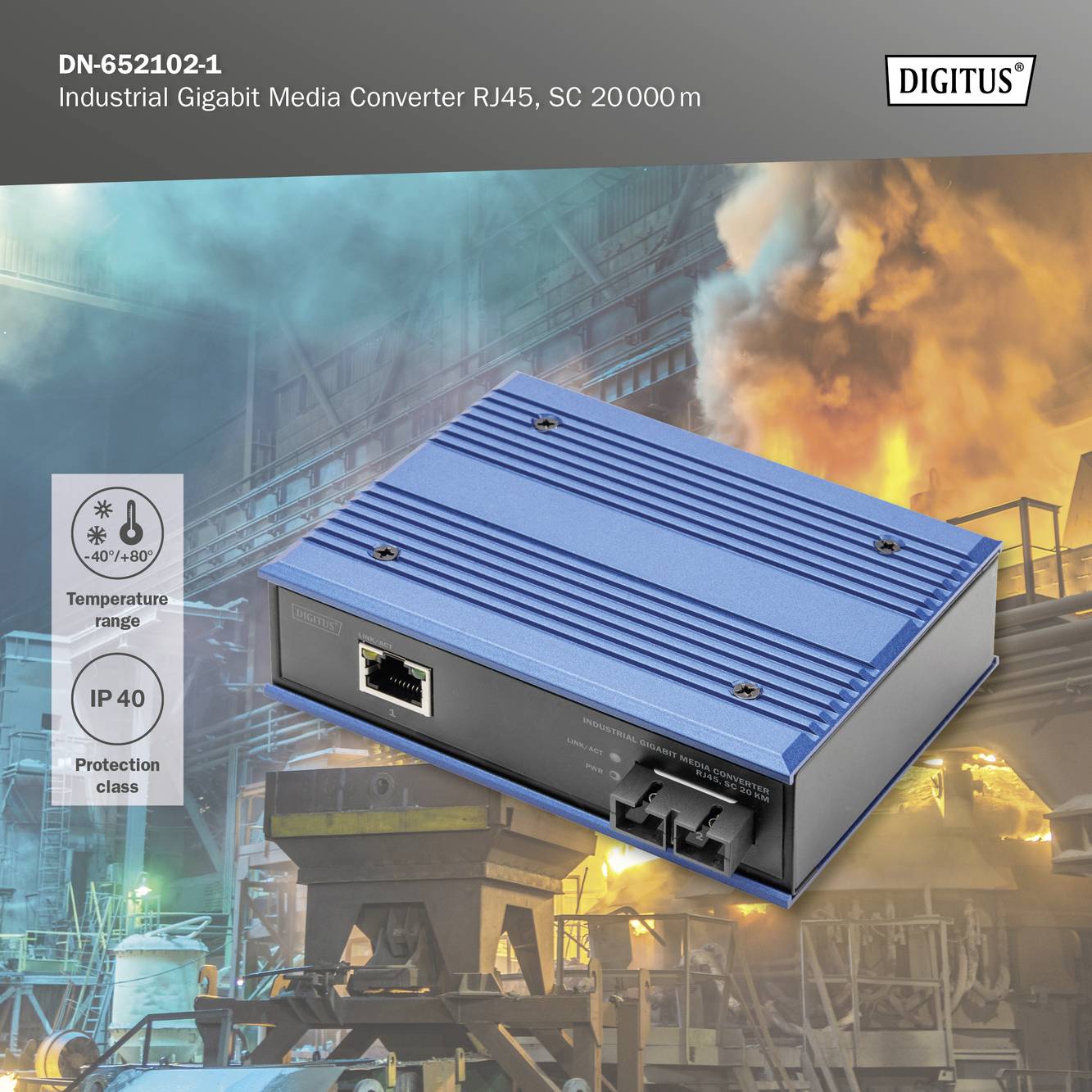 Niebieski przemysłowy konwerter mediów Gigabit. Tekst: 'Zasięg: 20 km', 'Klasa ochrony: IP40'. Tło: scena fabryczna z dymem.