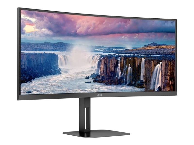 Ultraszeroki monitor wyświetla zapierającą dech w piersiach krajobrazową scenerię z wodospadami na tle dramatycznie zabarwionego nieba.