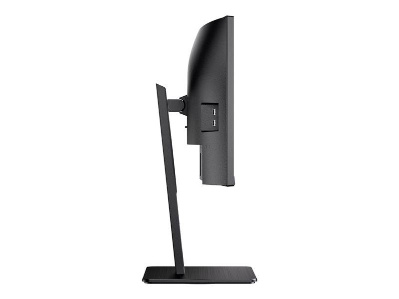 Widok z boku smukłego ekranu komputerowego z dwoma portami USB z tyłu. Monitor jest zamontowany na wąskiej podstawie.