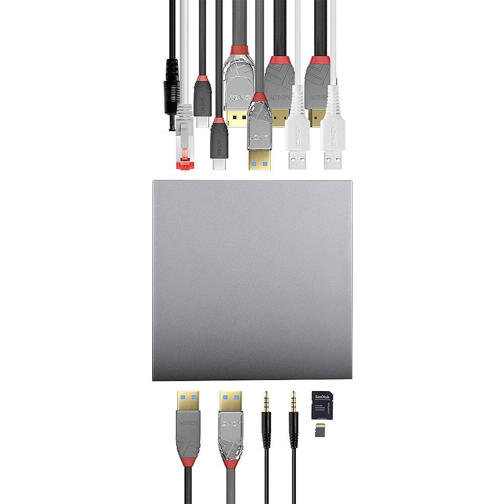 Kilka przewodów komputerowych i audio, w tym USB i HDMI, jest podłączonych do szarego koncentratora. Na dole pendrive USB.