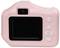 Widok z tyłu różowego aparatu cyfrowego z wyświetlaczem, celownikiem i przyciskami sterującymi po prawej stronie.