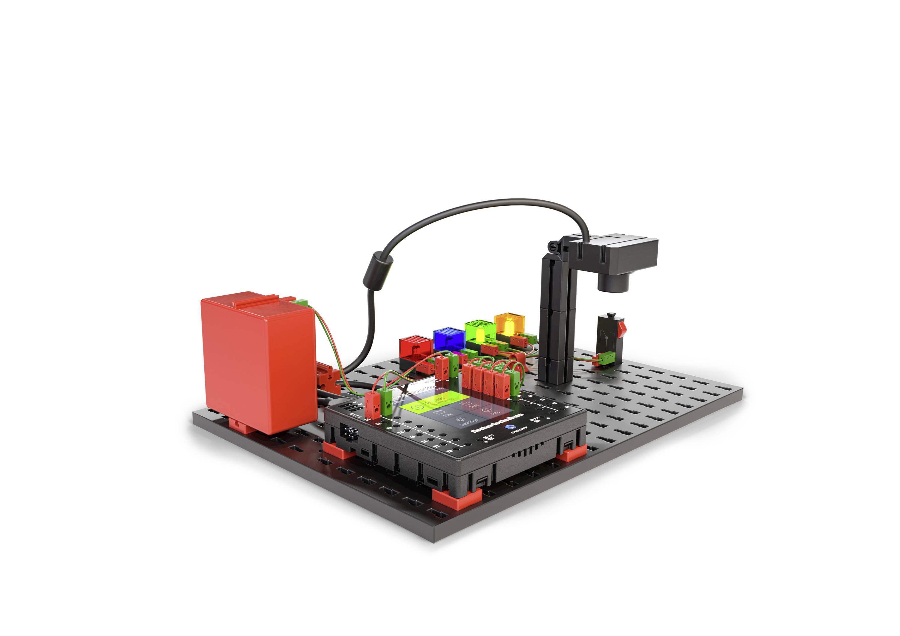 Zestaw składający się z czerwonych i czarnych komponentów umieszczonych na płycie, połączonych przewodami. Prezentuje techniczny lub eksperymentalny układ.