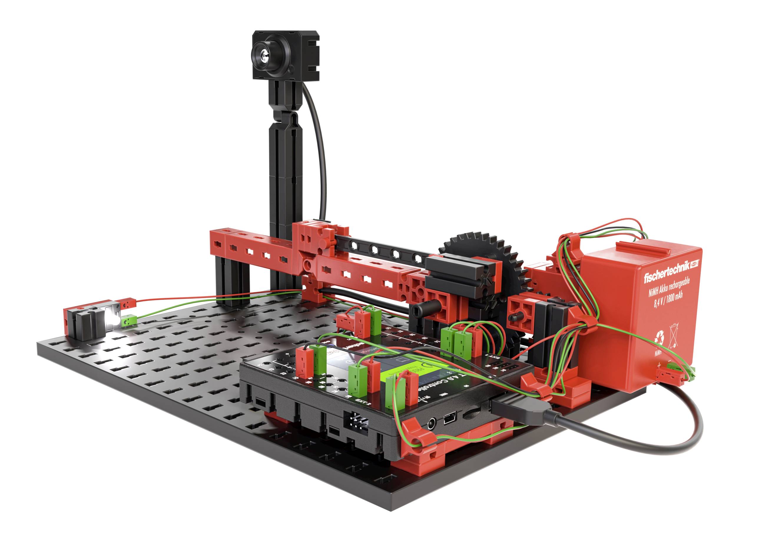 Czerwone ramię robota na czarnej podstawie z przewodami i elementami, prezentujące wyposażenie technologiczne do procesów pomiarowych lub produkcyjnych.