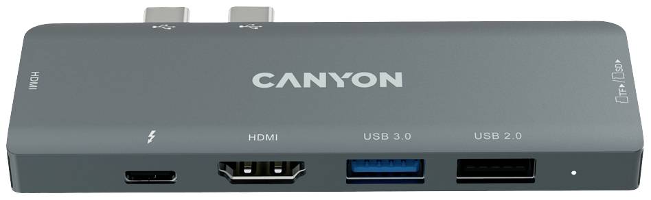Szary hub USB z wieloma portami: HDMI, USB 3.0, USB 2.0 oraz USB-C. Na przedniej stronie widoczna nazwa marki 'CANYON'.