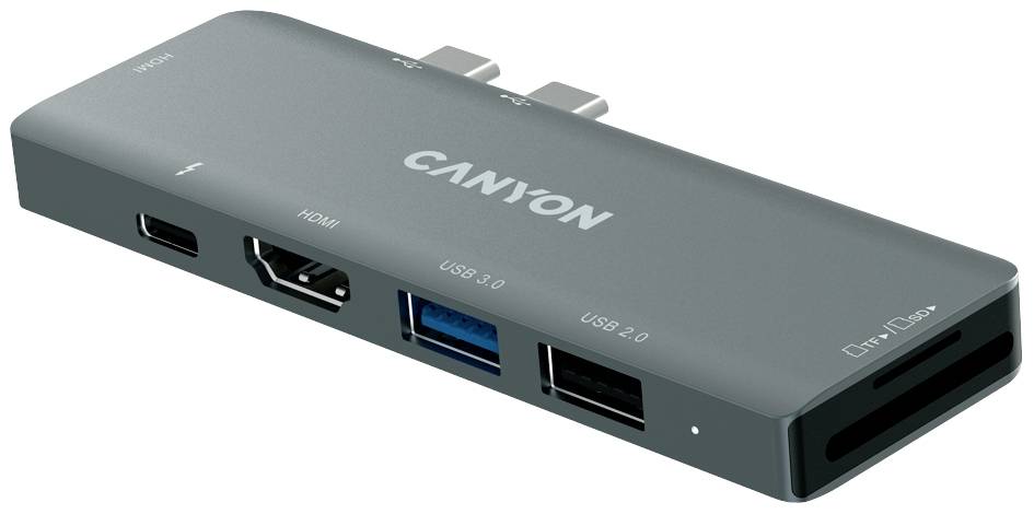 Szary hub USB-C z dwoma portami USB 3.0, złączem HDMI oraz slotem na karty z przodu. Oznaczenie 'CANYON' na górze.
