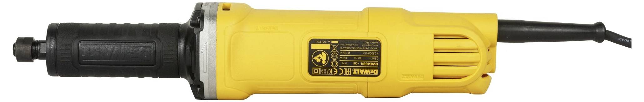 Żółte elektronarzędzie z czarnym uchwytem i czarnym przewodem, prawdopodobnie szlifierka prosta, leży na białej powierzchni.