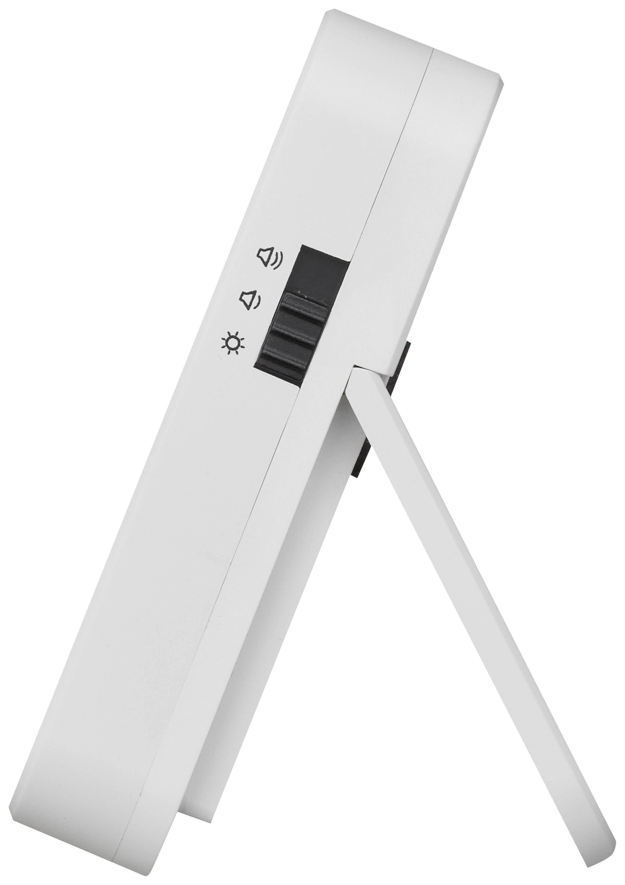 Cyfrowy budzik z boku, wyświetlacz pokazuje symbole ustawień głośności, dźwięku budzenia i jasności. Składany stojak.