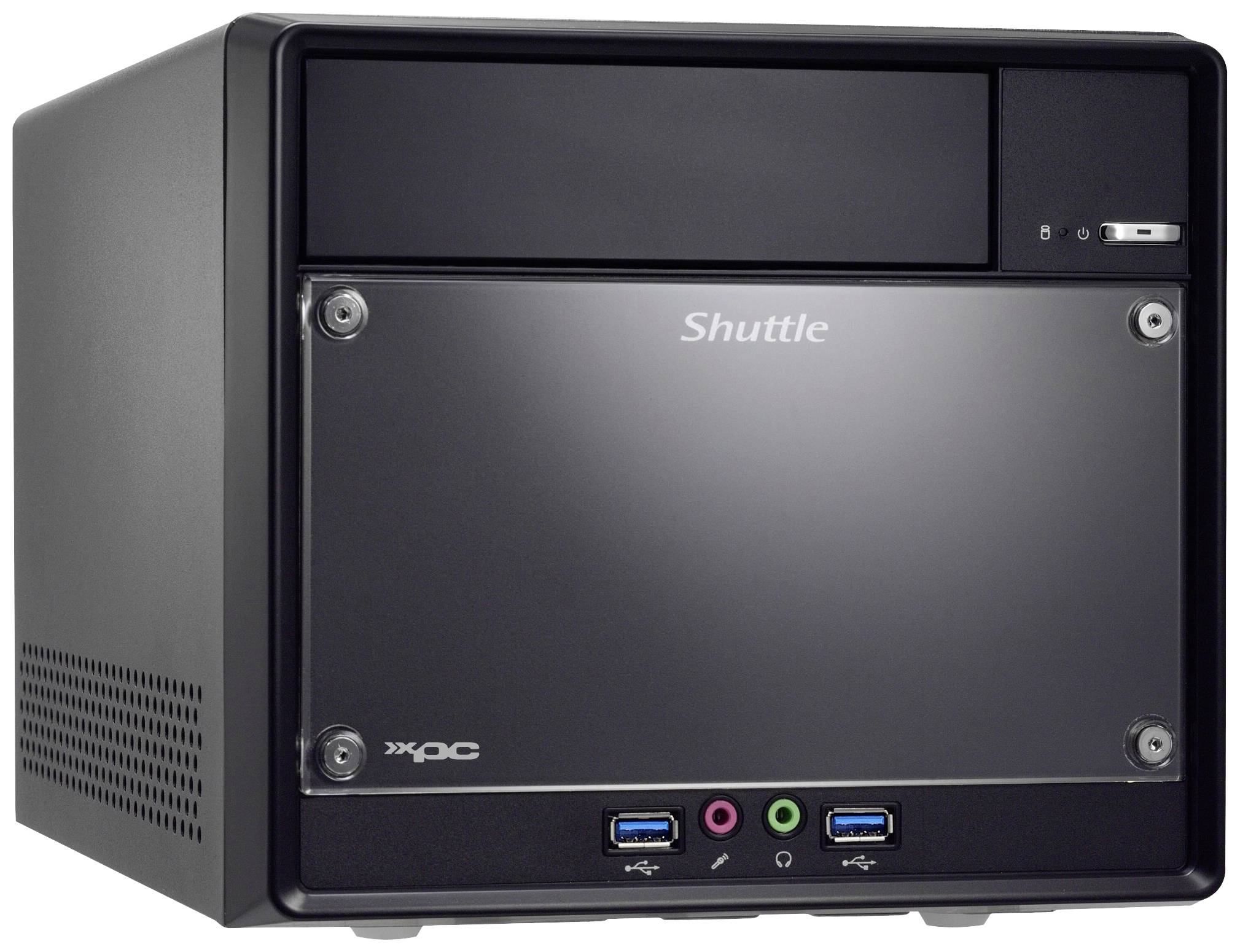 Czarny mini komputer z logo marki na przedniej ściance. Widok z przodu prezentuje złącza i napęd optyczny.