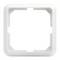 Biały, kwadratowy plastikowy ramka o zaokrąglonych krawędziach, prawdopodobnie do zakrycia gniazdka elektrycznego lub włącznika światła.