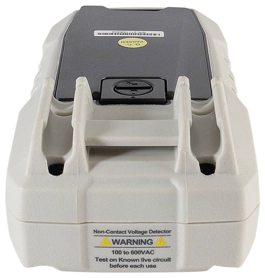 Bezdotykowy tester napięcia z ostrzeżeniem 'Uwaga 100 do 600VAC', przypominający o sprawdzeniu przed każdym użyciem.