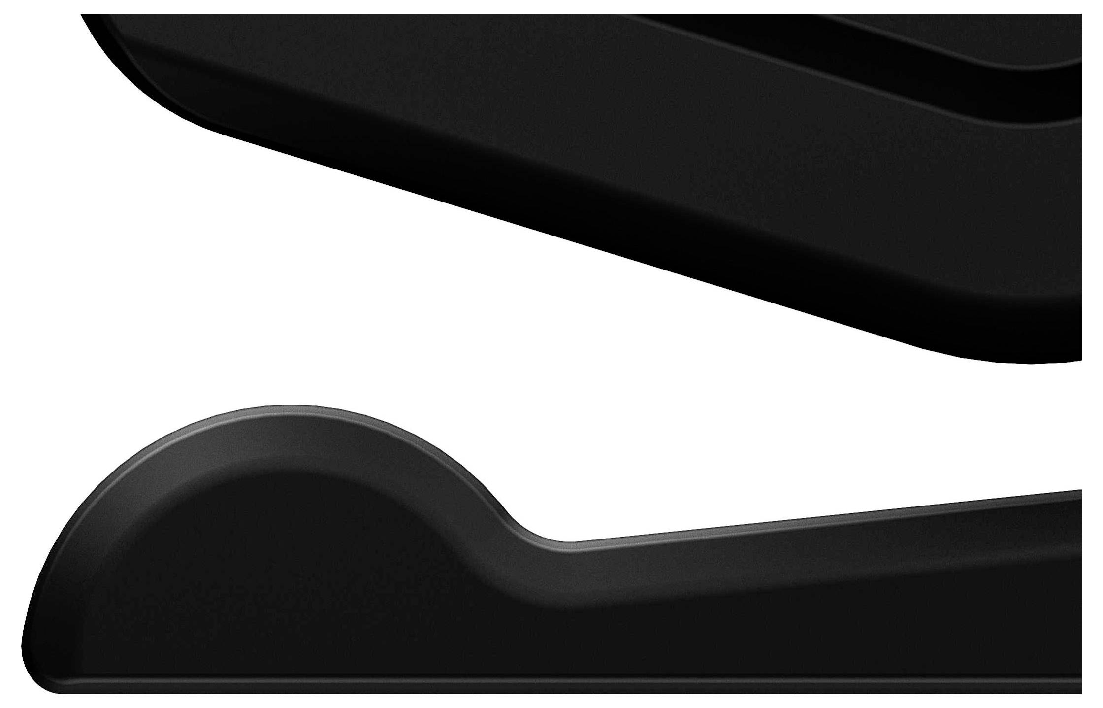 Zbliżenie dwóch czarnych, zaokrąglonych, długich obiektów ułożonych obok siebie na białym tle.