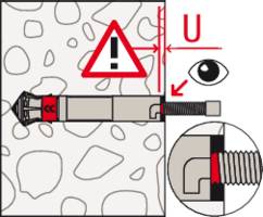 Diagram przedstawia odległość bezpieczeństwa (U) kołka w ścianie. Symbol ostrzeżenia oznacza ważne wskazówki bezpieczeństwa.