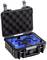 Solidna, czarna walizka z tworzywa sztucznego z otwartą pokrywą i niebieską, ochronną wkładką piankową, nadająca się do bezpiecznego transportu urządzeń.