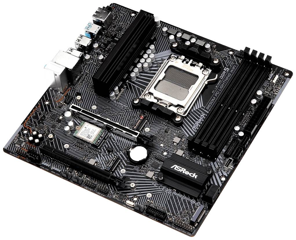 Czarna płyta główna ASRock z gniazdem procesora, dwoma slotami RAM i wieloma złączami, widok z góry.