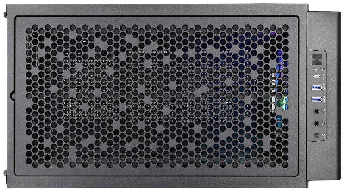 Czarna obudowa komputera z wzorem plastra miodu na przedniej ścianie, z kilkoma portami USB i przełącznikami po prawej stronie.