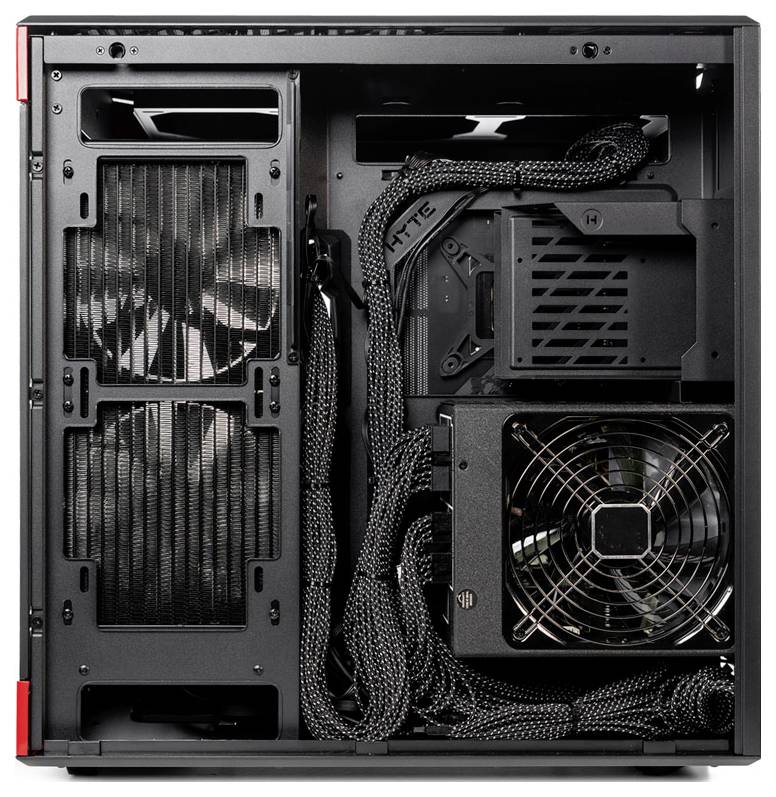 Widok wewnętrzny obudowy komputera z dwoma wentylatorami, zasilaczem i starannie poprowadzonymi kablami.