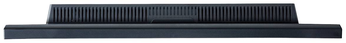 Czarny głośnik, prostokątny i płaski, z prążkowaną fakturą na przedniej ściance.