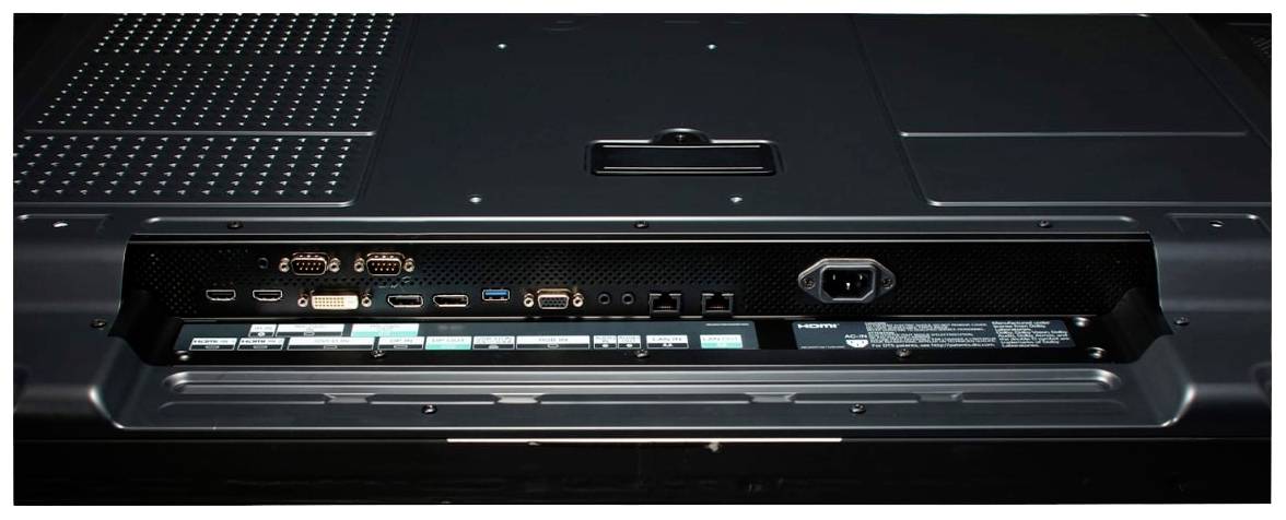 Tylna strona monitora z wieloma złączami, w tym HDMI, DisplayPort, USB i złączem sieciowym. Gniazdo zasilania po prawej stronie.