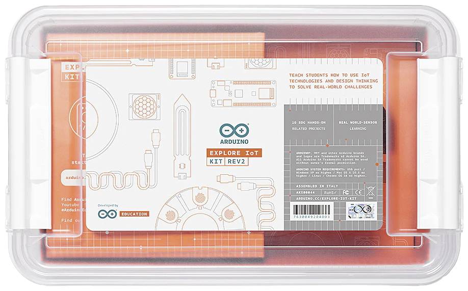 Przezroczyste pudełko z zestawem 'Arduino Explore IoT Kit', zawierające narzędzia do korzystania z technologii IoT oraz rozwiązywania rzeczywistych problemów.