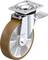 Kółko skrętne 'Blickle' z szarą metalową obudową i brązowym kołem. Odpowiednie do mebli przemysłowych lub urządzeń wymagających lekkiego przemieszczania.