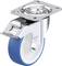 Rolka z niebieskim bieżnikiem i srebrną obudową, która może być zamontowana na meblach lub urządzeniach, umożliwiając łatwe przemieszczanie.