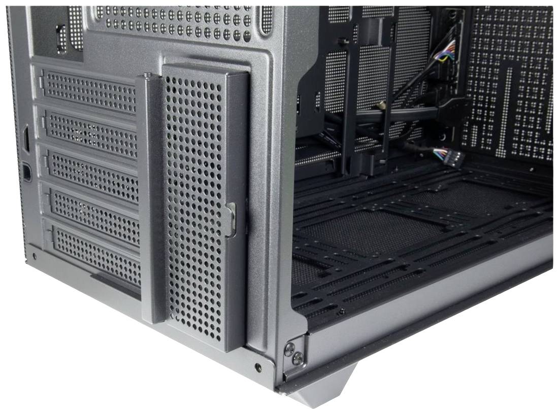 Obudowa komputera z odkrytymi slotami PCI oraz przestrzenią na zasilacz. Widok wewnętrzny przedstawia miejsce do montażu podzespołów.