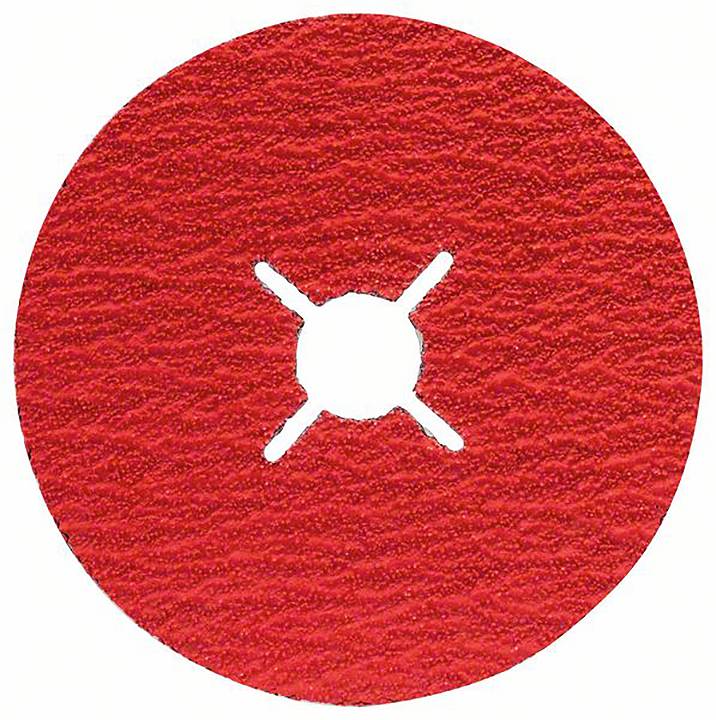 Czerwona okrągła tarcza ścierna z centralnym otworem i rozciętym krzyżowo mocowaniem do zamocowania na urządzeniu szlifierskim. Struktura powierzchni jest szorstka.