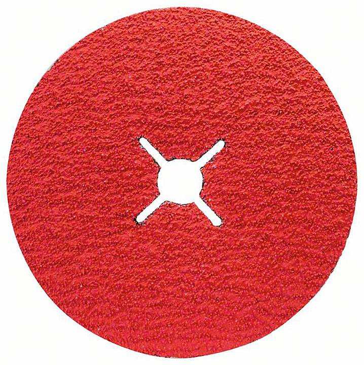Czerwony papier ścierny z wzorem kołowym i krzyżowym wcięciem pośrodku.