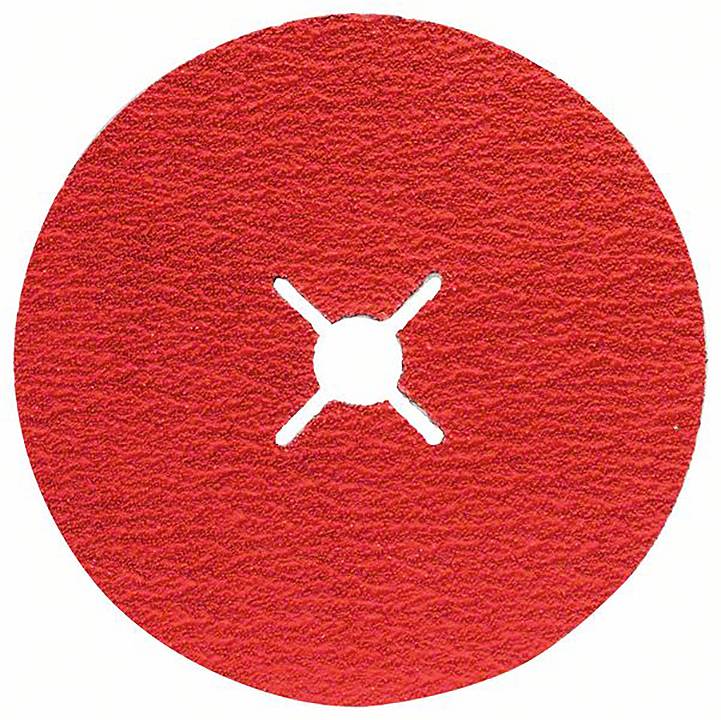 Czerwony papier ścierny o okrągłym kształcie z otworem w kształcie litery X pośrodku.