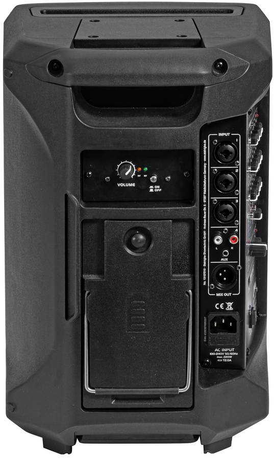 Widok z tyłu czarnego głośnika z wieloma wejściami, regulatorem głośności oraz złączami dla mikrofonu i innych urządzeń.