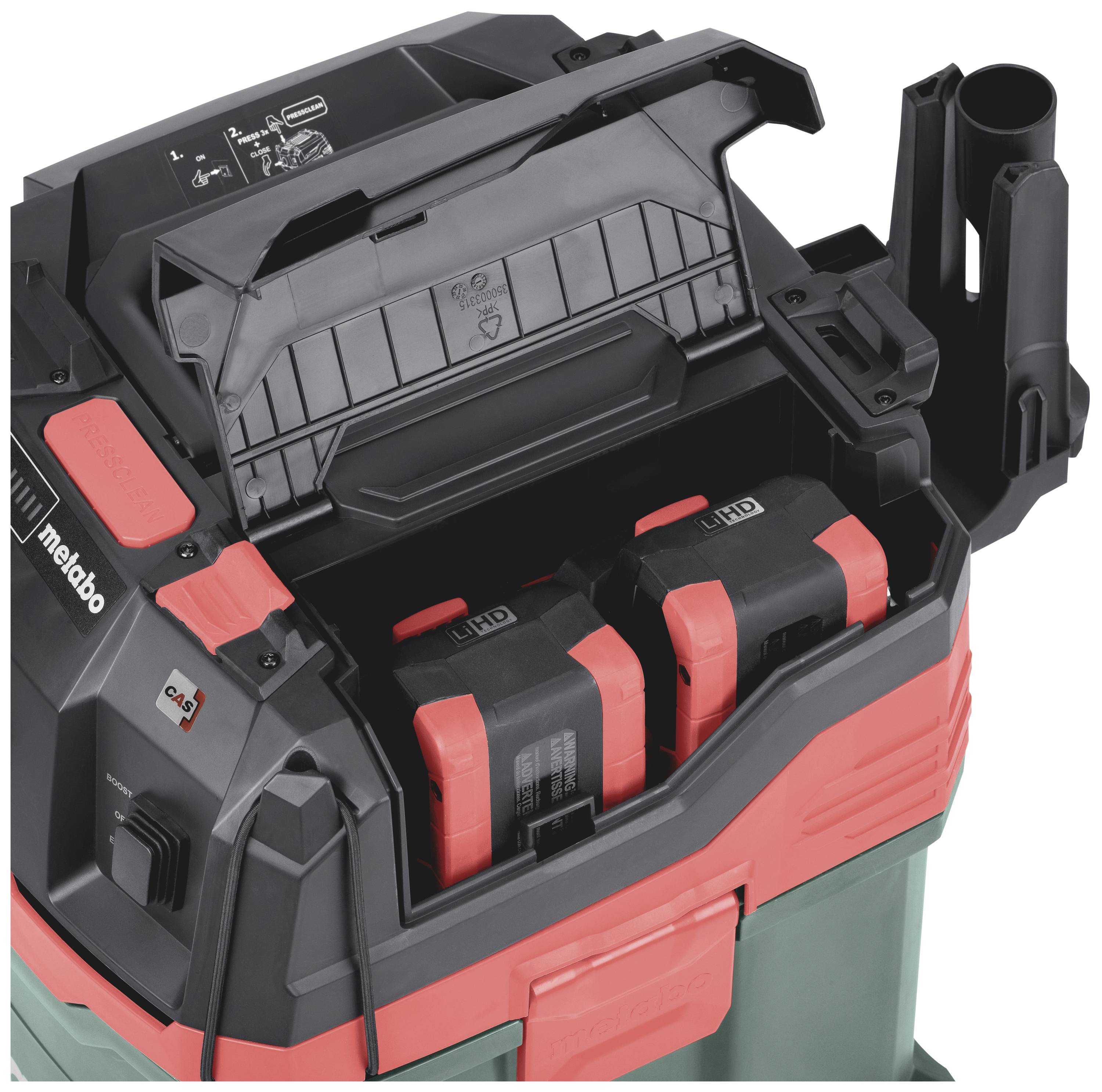 'Odkurzacz z otwartą komorą, w której widoczne są dwa akumulatory; oba oznaczone dużymi literami 'HD'.'