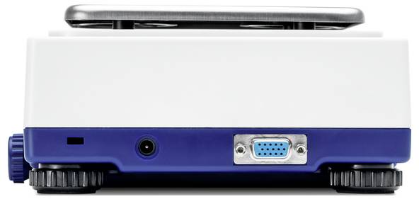 Urządzenie laboratoryjne z pokrętłem, złączem zasilania i interfejsem VGA, sfotografowane od spodu.