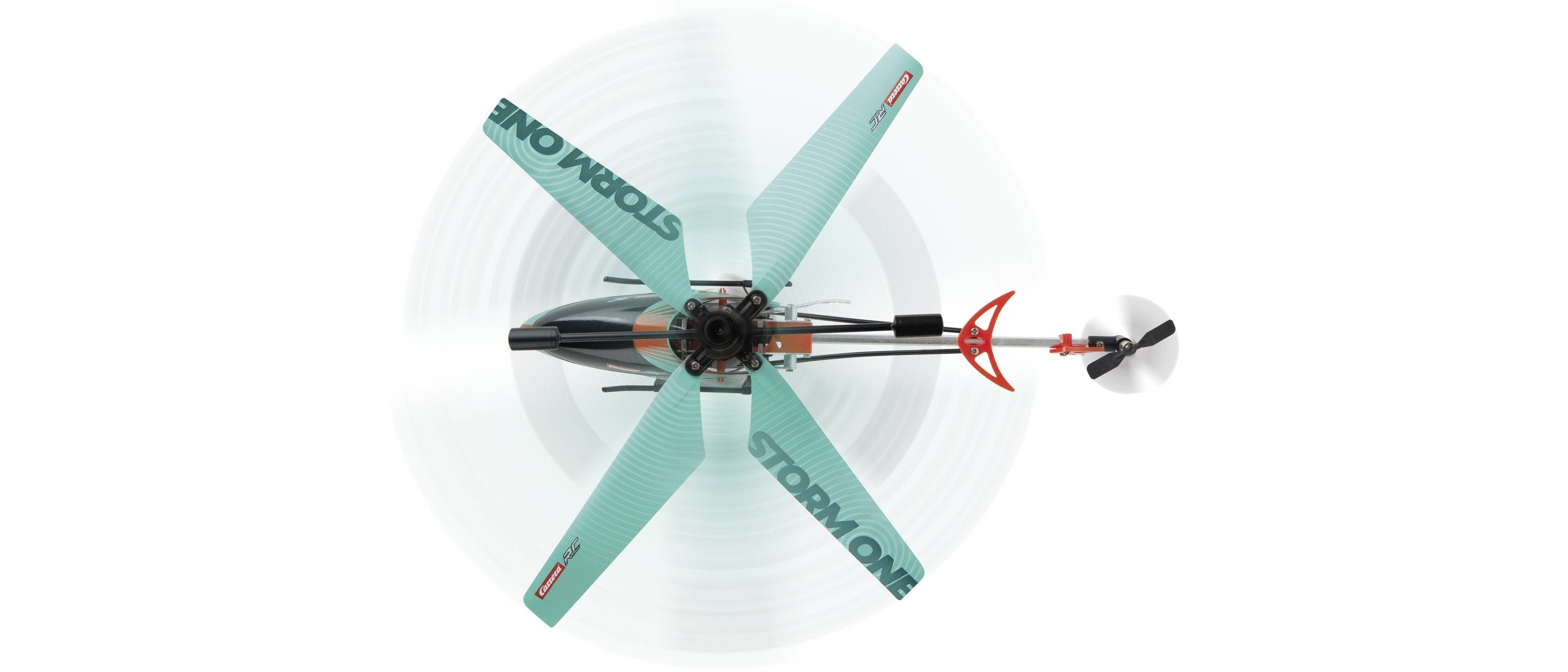 Miniaturowy śmigłowiec z czterema niebieskim łopatami wirnika, widziany z perspektywy z góry.