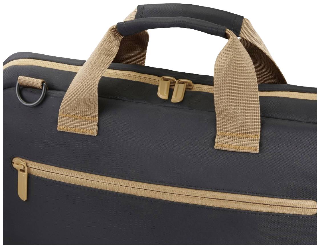 Czarna torba z brązowymi uchwytami i zamkami błyskawicznymi. Widoczna górna część oraz szczegół zamknięcia.