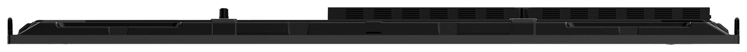 Czarna klawiatura komputerowa widziana z boku, ukazująca płaskie klawisze i kompaktową budowę.