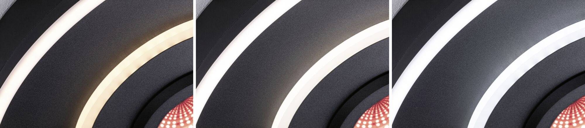 Trzy pierścienie ułożone obok siebie o zmieniających się odcieniach - od ciepłych do zimnych - na ciemnym tle, pod spodem czerwony akcent.