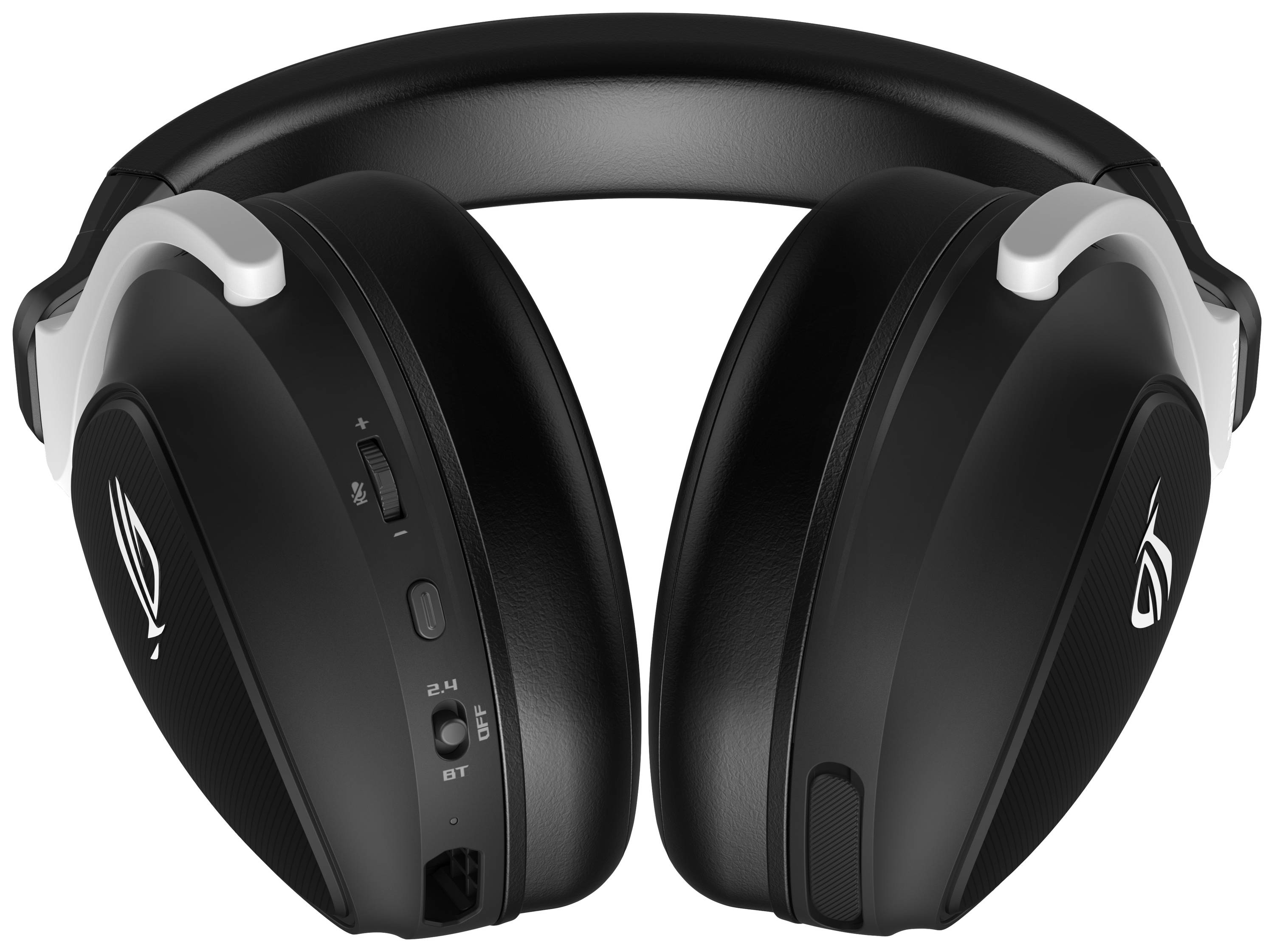 Czarne słuchawki nauszne z białymi detalami i przyciskami sterującymi po boku. Odpowiednie do grania i słuchania muzyki.