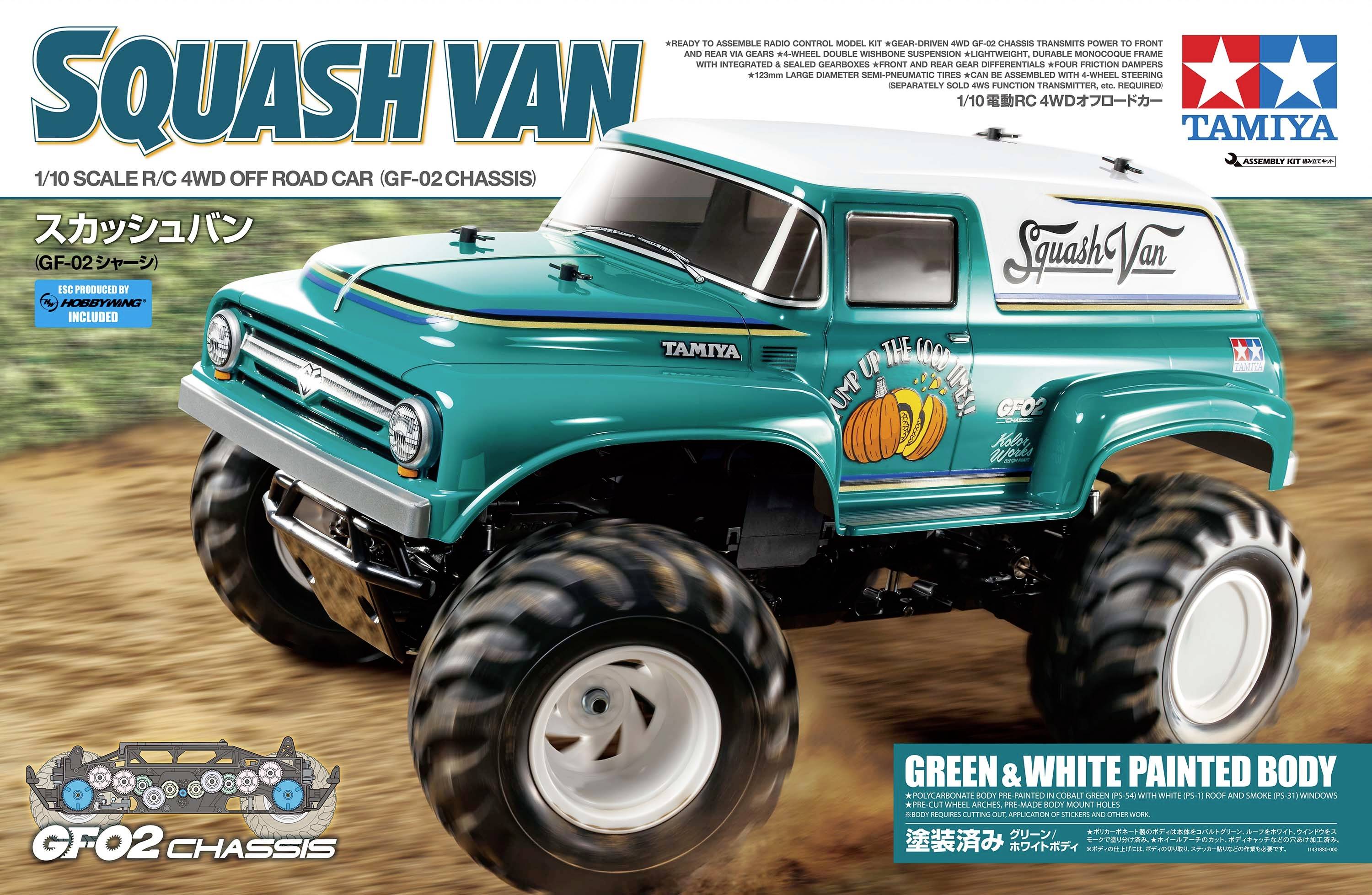 Niebieski model zdalnie sterowanego samochodu terenowego Tamiya 'Squash Van' z dużymi kołami jest przedstawiony. Napis: 'Keep on Truckin''.