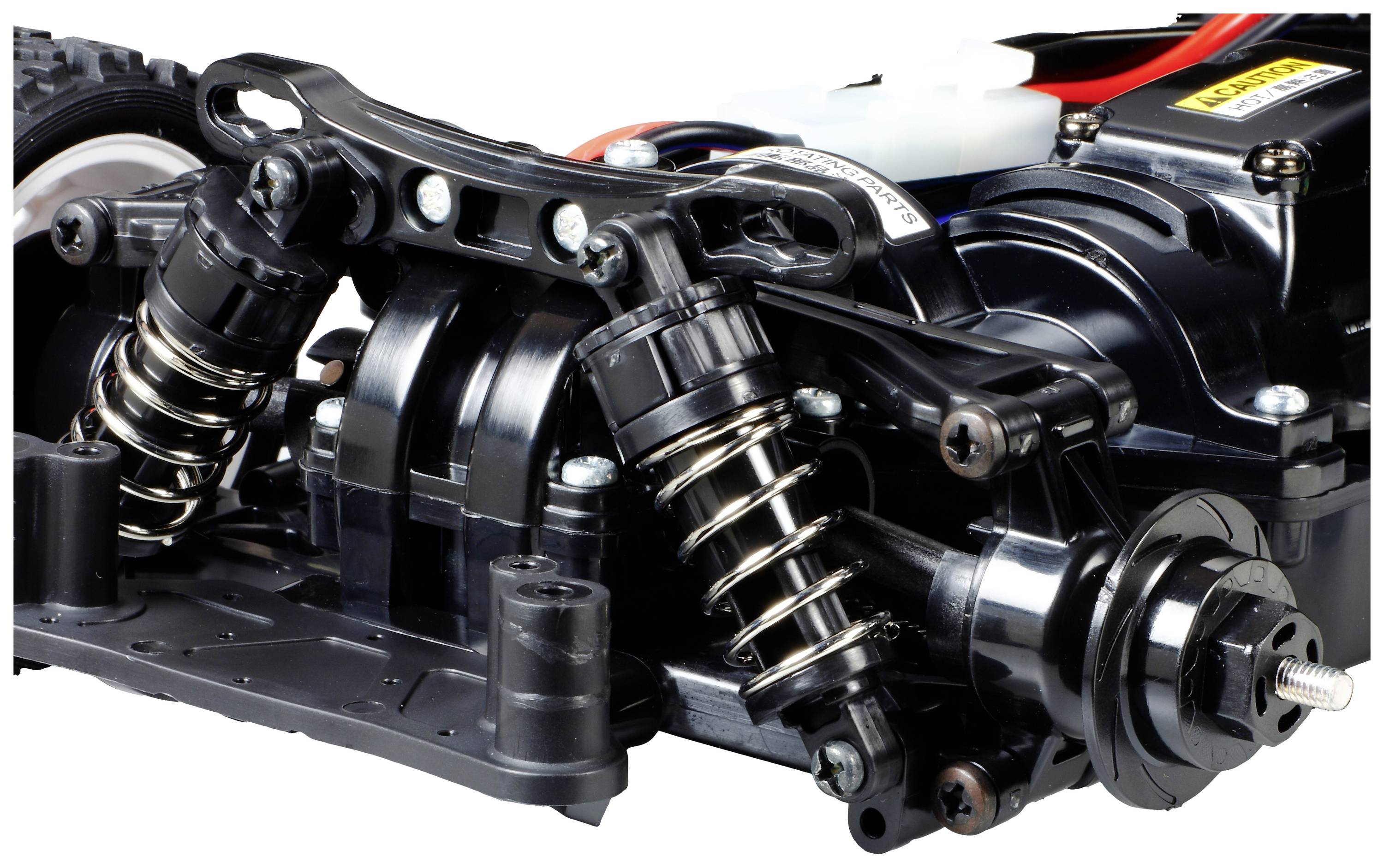 Zbliżenie amortyzowanego zawieszenia modelu samochodu. Przedstawia sprężyny i elementy mocujące, które poprawiają stabilność i amortyzację.