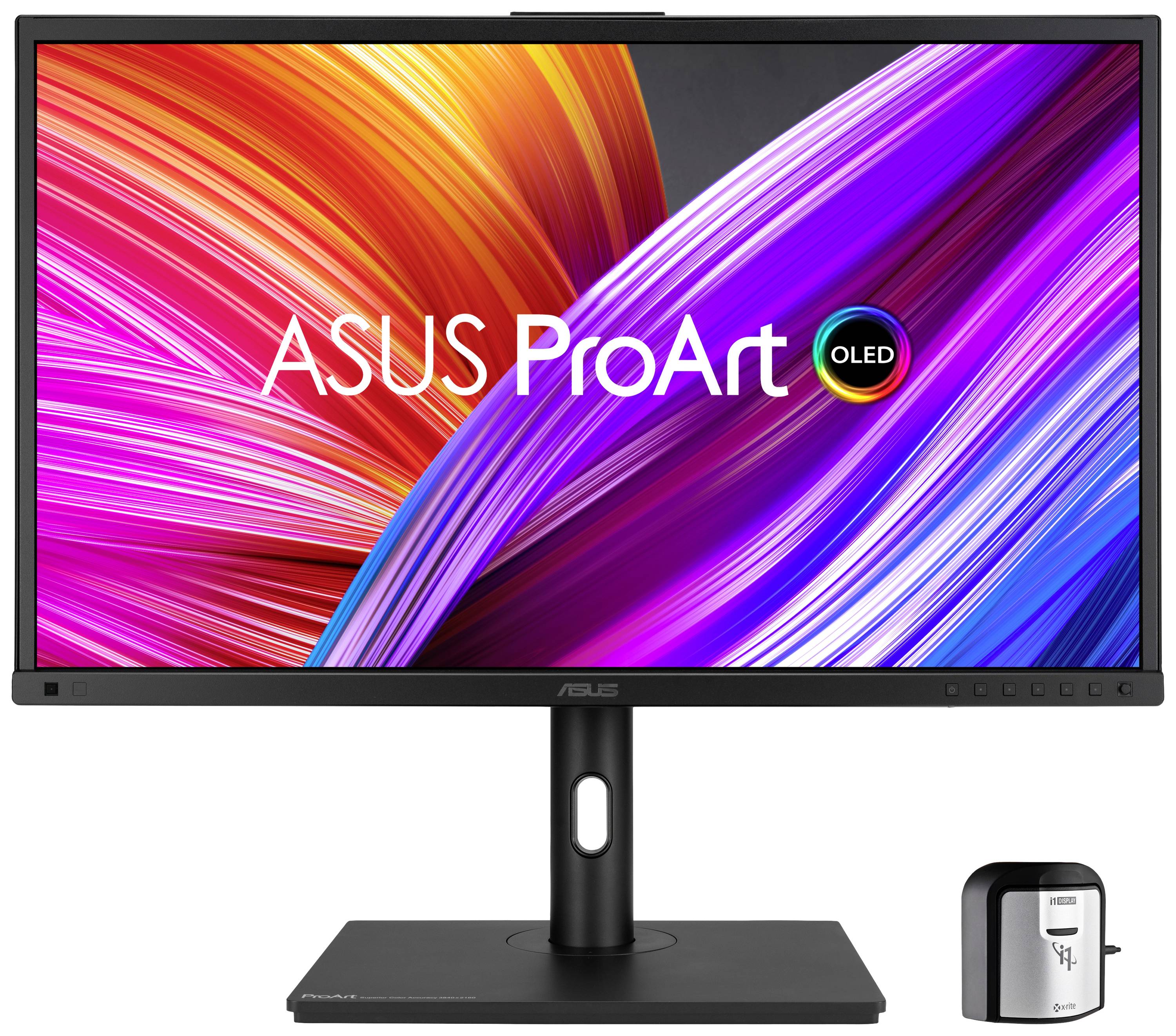 Monitor ASUS ProArt OLED z żywymi kolorami na ekranie, przed którym znajduje się urządzenie kalibracyjne.