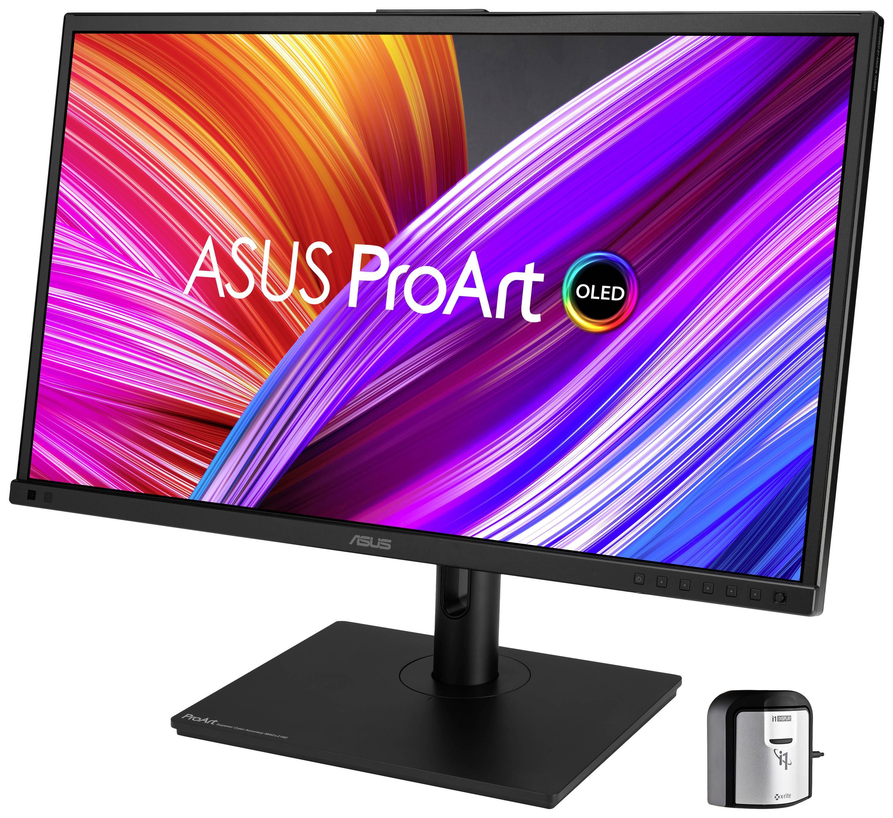 Monitor ASUS ProArt OLED wyświetla żywe kolory na ekranie. Obok niego leży urządzenie kalibracyjne. Idealny dla grafików.