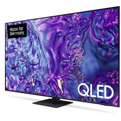 Telewizor QLED z dużym ekranem wyświetla abstrakcyjne, kolorowe wzory w odcieniach fioletu i błękitu. Napis: 'Made for Germany'.