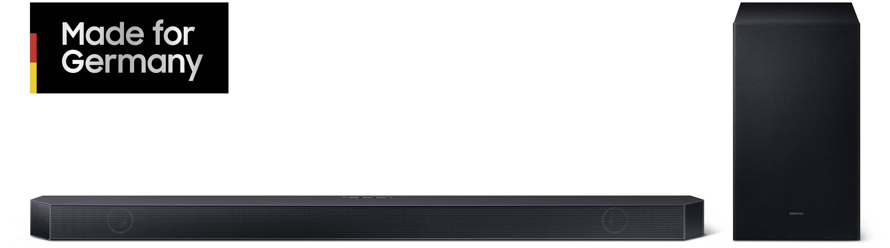 Czarna soundbar z subwooferem; tekst 'Made for Germany' z kolorami flagi niemieckiej w tle.