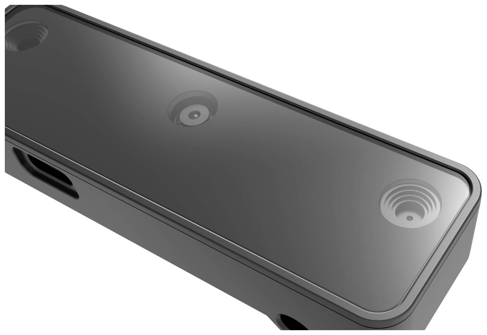 Prostokątna obudowa z tworzywa sztucznego z kilkoma okrągłymi wypukłościami na powierzchni, prawdopodobnie czujnikami.