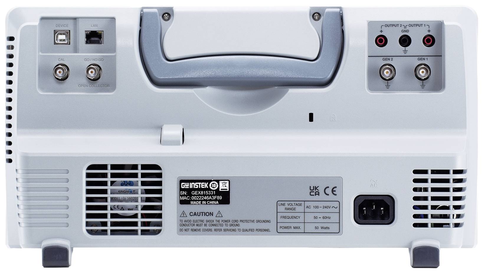 Widok z tyłu urządzenia elektronicznego z portami, wentylatorem i gniazdem zasilania. Uchwyt na górze, tabliczka informacyjna na dole.