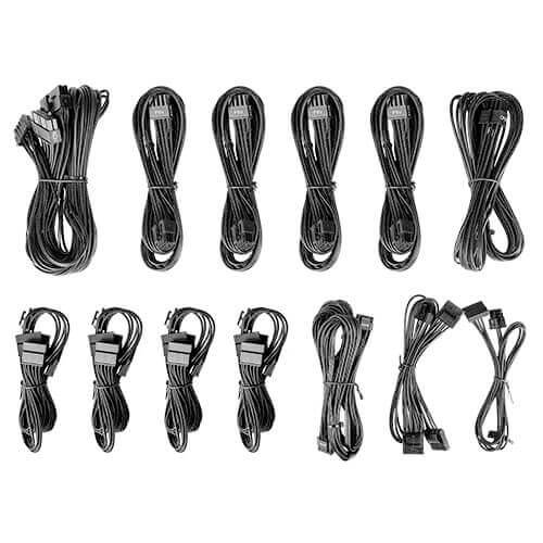 Jedenaście czarnych kabli, ułożonych w cztery rzędy, w tym kable sieciowe i transmisji danych z różnymi złączami, odpowiednie do urządzeń elektronicznych.